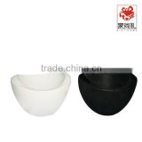 white ceramic planter and pot