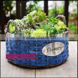 round wood chip blue flower basket