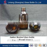 Amber glass bottle boston round supplier in China