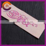 Pink color custom logo made cheap woven garment labels