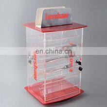 Стеллаж для хранения с замками и прозрачными красными акриловыми слоями для выставки ножей