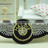 hot sale china factory directly make wing shape embroidery patch in stock, silver and gold thread embroidery badge iron on back