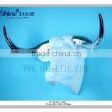 Large buffalo head wall sculpture with silver horn