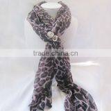 Leopard print scarf with rhinestone charm clasp