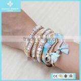 Natural Mother of Pearl Mix Bead Bracelet With Leaf Charm on Beige Leather thumbnail-4