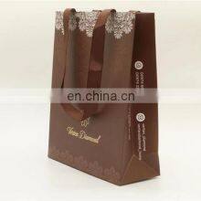 Luxury Custom Logo Gold Foil Printed White Cloth Paper Packaging Bag With Handle thumbnail-3