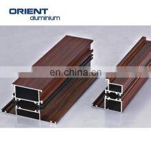 Malaysia Oem/odm Accepted Wholesale Custom Wood Grain Hot Sale Casement Aluminum Spring Door Profile Frame thumbnail-4