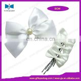 white satin ribbon bow with pearl bead