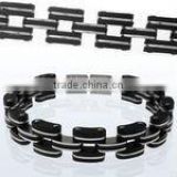Stainless steel bracelet with rubber accents and wide layered links
