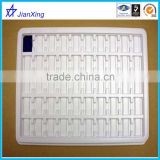 white plastic electronics components tray