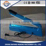 Cheap Price High Quality Aluminum Body Hand Pressing Impulse Side-cut Sealer Machine thumbnail-1