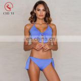 Hot selling sexy ladies beach bikini with tie side bottom, wholesale custom made seamless reversible bikini swimsuit