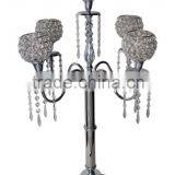 wedding centerpieces candelabra with crystal beaded votive and hangings.