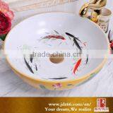 Hot sale yellow bathroom wash sink with vivid goldfish lining