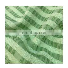 High-end stock lot textile fabrics rayon polyester dress jacquard fabrics