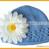 Crochet kids hat with daisy flower