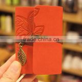 Embossing leaf design leather card holder bag made in china                        
                                                                                Supplier's Choice