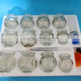Group of Glass Cupping Jar Set with Scrapes the skin the board,Tweezers,Essential oil,Fire rod and Alcohol burner