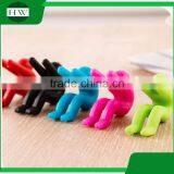 Multipurpose Eco Silicone Person Phone Tableware Raise up Anti Overflow Pot Lid Holder thumbnail-4