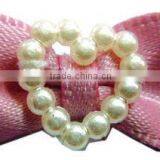 Ribbon Bows With a Heart-shaped Bead Necklace thumbnail-1