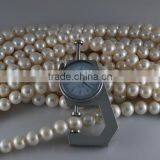 3-4mm AA White Round Freshwater Pearl Strand thumbnail-2