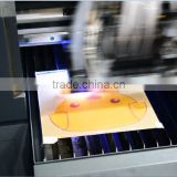 Cheap co2 automatic CNC laser cutting machine and uv printing integrated machine for sale