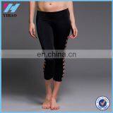Yihao Sales Low MOQ Legging Sport Women Yoga Capris Spandex /Polyester Side Hollow Custom Yoga Leggings thumbnail-1