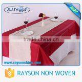 Hot Sale in German 1.4m x 1.4/2.4/7m, 1.5m x 1.5m Party Disposable Non Woven Fabric Tablecloth in Roll thumbnail-1