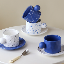 Hand-made splash-ink ceramic cups and saucers