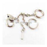 Polished Nickel Key Shape Keychain