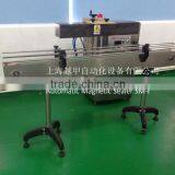 Automatic Magnetic Aluminum Foil Sealing Machine For Coloring Material thumbnail-1