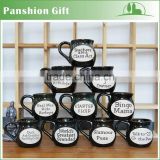 Black ceramic milk cup with various letters