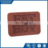 factory direct sale first-class embossed jeans pu leather labels design