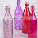 round 1liter glass juice bottle with metal buckle