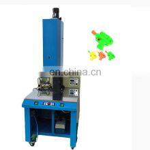 Пластиковая машинка для ультразвукового сварки водных пистолетов - детских игрушек. Пластиковая ультразвуковая сварочная машина