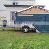 Australia standard off road hard floor camper trailer with 14 oz tent and kitchen system.