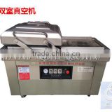 Double chamber vacuum packaging machine