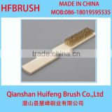 Wire wooden handle brush