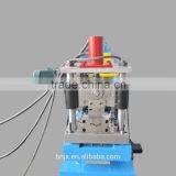 Rolling shutter door forming machine