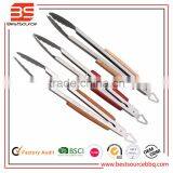 Kitchen Food Tongs in Stainless Steel With Wooden Slip Handle thumbnail-1