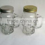Skull Head Glass Jars With Handle and Metal Lid thumbnail-1