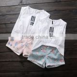 2016 summer white sleeveless tee and flowers shorts 2 pieces suit for party or beach