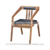 Wooden chair with leather cushion