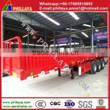 Heavy Duty Tri Axle Flatbed Side Wall Open Cargo Semi Truck Trailer for Sale Draw Bar Trailer thumbnail-3