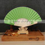 Factory Direct Bamboo Hand Fan Wedding Gift Cloth Folding Hand Fan in Plain Color thumbnail-5