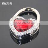 Red Crystal Heart Shaped Handbag Hooks White Rhinestones Portable Metal Folding Bag Holder Heart thumbnail-1