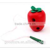 Wooden Caterpillar Eating Red Apple thumbnail-4