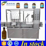 Factory price bottle filling capping and labeling machine,syrup filling machine price