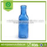 small spray blue round glass milk bottle oil &rope vase