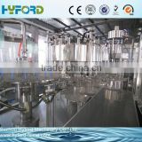 2015 Full automatic tea/juice filling and sealing machine